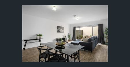 Modern Three-Bedroom Townhouse - Photo 2