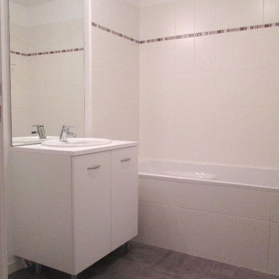 Location Appartement 3 pièces 66m² ST JACQUES DE LA LANDE 35136 - Photo 1