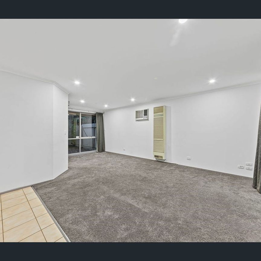 Comfortable Family Home with Spacious Outdoor Entertaining! - Photo 1