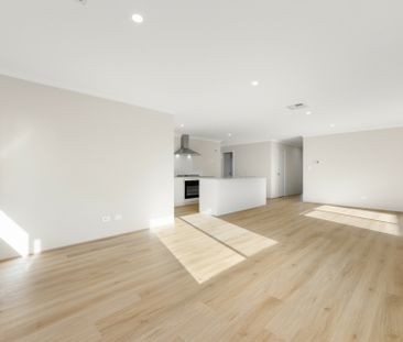 Brand New Four Bedroom Home! - Photo 1