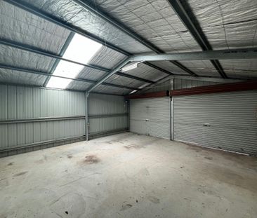 Bright Family Home with Sunroom and Outdoor Living Space - Photo 2