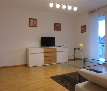 Location Appartement HUNINGUE 840 € CC - Photo 4
