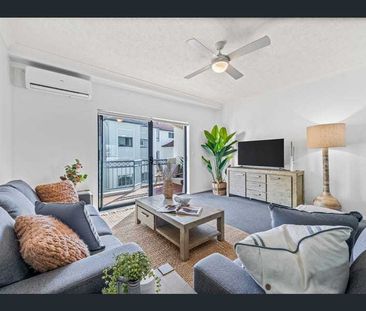 BEACHSIDE FURNISHED TOWNHOUSE APARTMENT - Photo 1