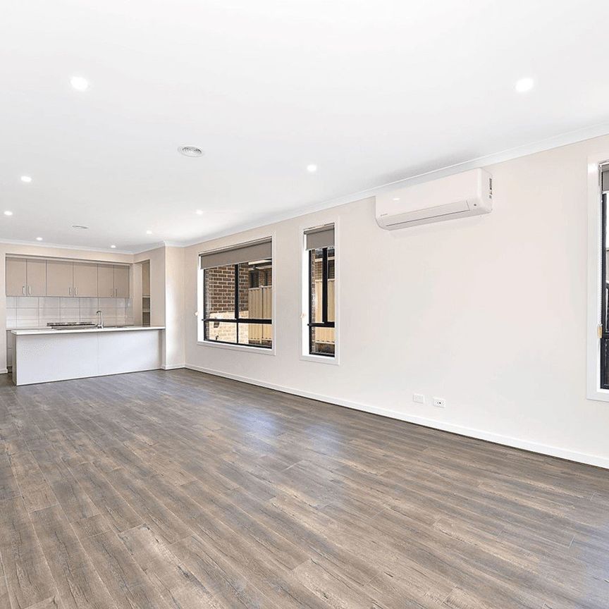 Spacious, Near-New Living with Dual Zones in a Prime Attwood Setting - Photo 1