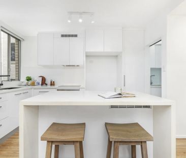 Renovated Three-Bedroom Retreat in Ultra Convenient Location Moment... - Photo 4