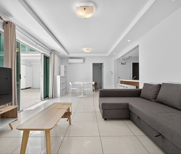 2 Bedroom Unit with Extra Sunroom, Large Balcony and Huge Grassed B... - Photo 5