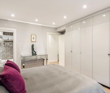A bright and well-proportioned two-bedroom apartment situated on the first floor of a sought-after Kensington High Street building, offering generous living space in the heart of Kensington. - Photo 6