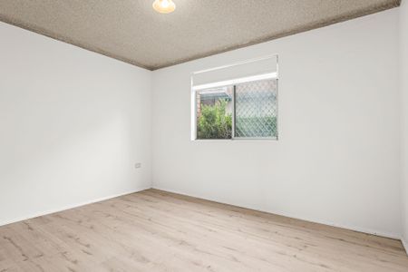 Neat and Tidy Ground Floor Unit - Photo 2