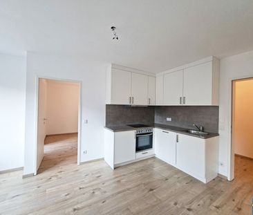 Moderne 2-Zimmer-Wohnung mit Balkon & perfekter U1-Anbindung Trosts... - Photo 1