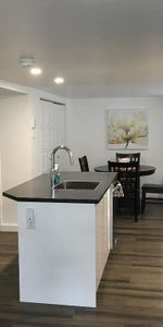 4 1/2 triplex, demi sous-sol à louer - Photo 3