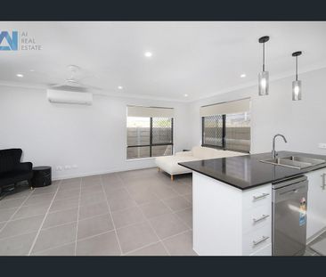 Family-Friendly Modern Home in Logan Reserve - Photo 2