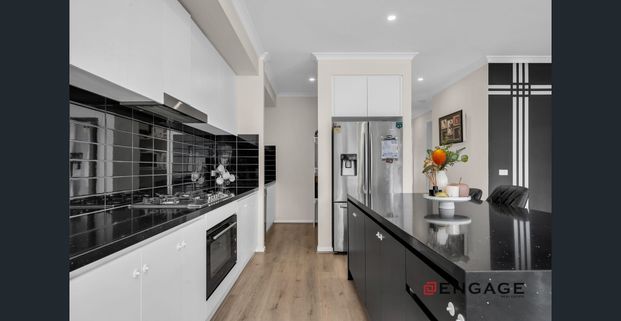 Young Modern Family Living in Thriving Weir Views - Photo 1