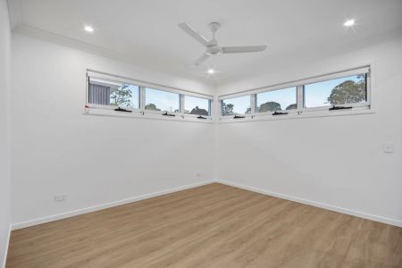 Brand New Family Home in Oxley's Premier New Estate - Photo 2