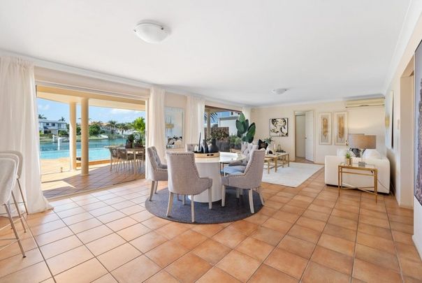 Stunning Canal-Front Home with Pontoon â Convenience Meets Lifestyle - Photo 1