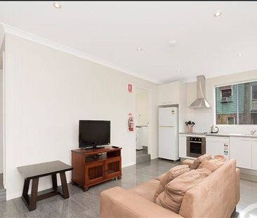 Modern Three Bedroom Unit - Great location and close to all ameniti... - Photo 2