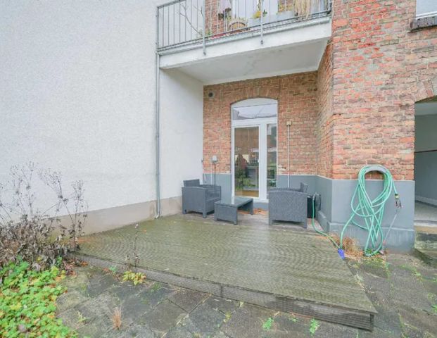 1-Zi.-Wohnung mit Wohnküche, Terrasse/Garten in Rtg-Mitte! - Photo 1