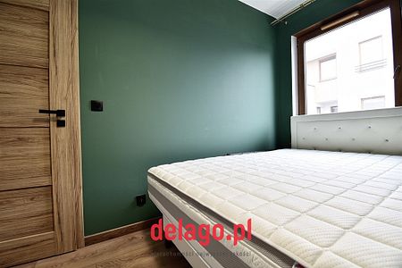 Elegancki dwupoziomowy apartament z ogródkiem - Zdjęcie 4