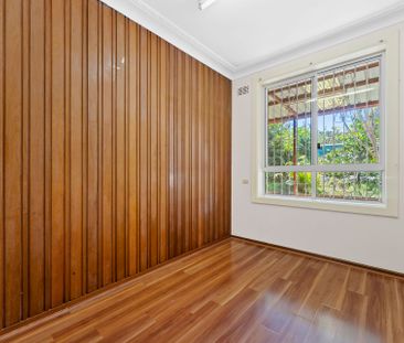 Spacious 5-Bedroom Family Home with Leafy Reserve Outlooks - Photo 4