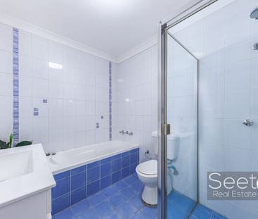 Top-Floor Spacious Home with Sunlight in a convenient location - Photo 4