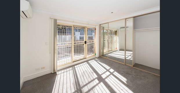 SPLIT LEVEL TOWNHOUSE IN PRIME LOCATION - Photo 1