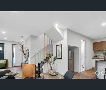 Modern 4-Bedroom Retreat Minutes from the Beach - Photo 3