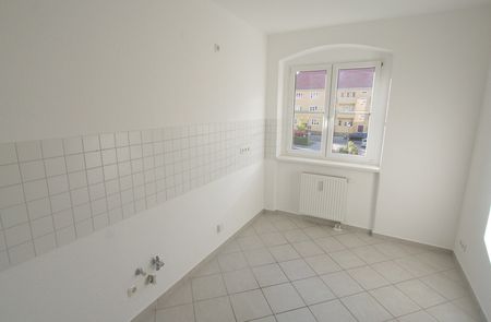 Lichtdurchflutete 3-Zimmer Wohnung in der Curiesiedlung mit Tiefgarage und Gartenblick - Photo 2