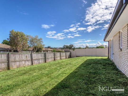 FAMILY HOME ON BIG CORNER BLOCK! - Photo 1