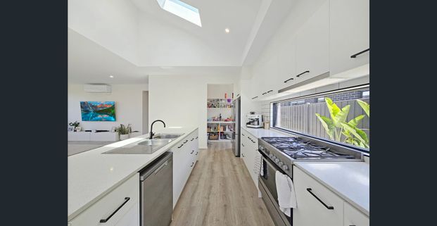 Eye-Catching Family Home - Photo 1