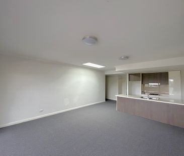 Brand new carpet, three bright rooms with windows, and two parking ... - Photo 3