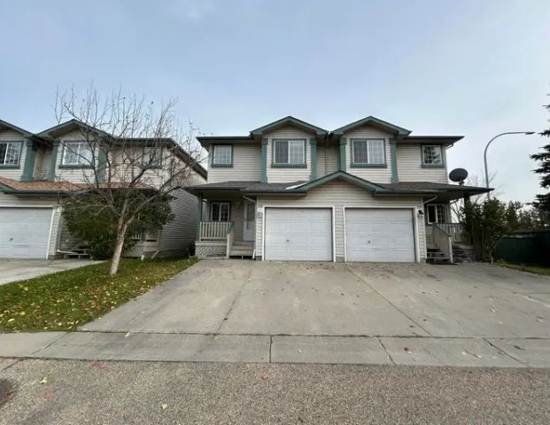 Renovated and Bright 2 Bedroom 2.5 Bathroom Townhouse with Garage! | 2004 Grantham Court Northwest, Edmonton - Photo 1