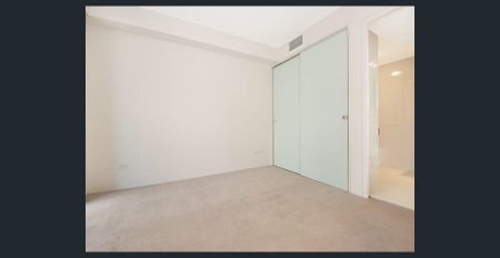 Spacious unit in Prestigious Riverfront Waters Edge Complex - Photo 2