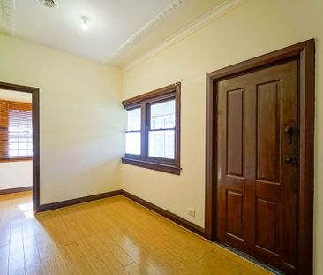 Spacious 3-Bedroom Home with Yard & Parking - Photo 1