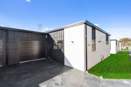 These exceptional two-bedroom units in Glenview are nestled within a secured gated community, featuring an automatic gate. - Photo 3