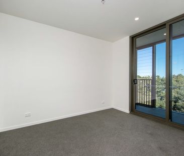 Sleek & Secure Apartment Close to Everything - Photo 3