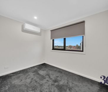 Stylish 3-Bedroom Townhouse with Modern Comforts & Thoughtful Design - Photo 2
