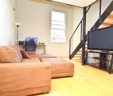 Furnished Loft-Style Living in the Heart of the CBD - Photo 1