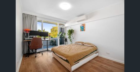 Top-Floor Luxury with Sweeping Views in a Prime Lifestyle Location - Photo 3