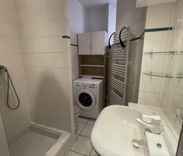 Un lumineux 3 pièces avec un balcon Avenue des Vosges - Photo 4