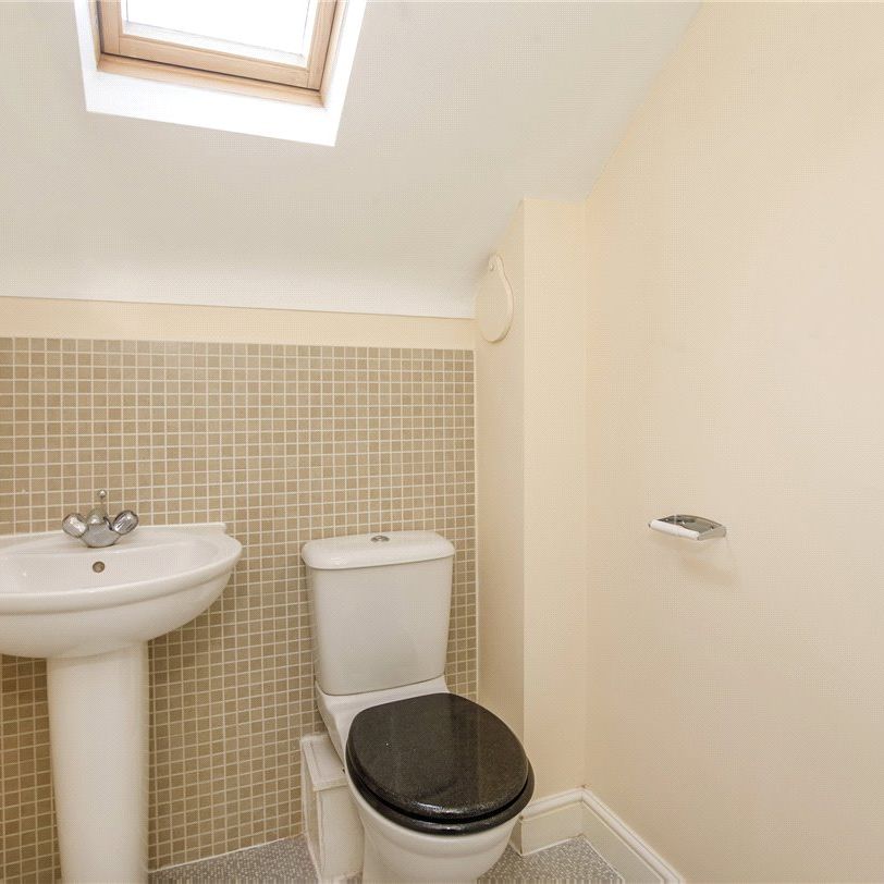 Well-presented and deceptively spacious three bedroom, three-storey terraced in this cul-de-sac on the sought after estate in Harworth. - Photo 1