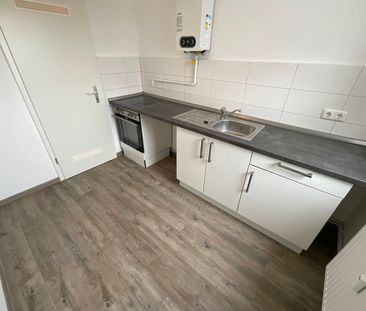 2,5 Zimmer-Wohnung mit Balkon und modernisiertem Tageslichtbad mit ... - Foto 1