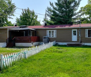 Maison de plain-pied à Saint-Jean-sur-Richelieu - Photo 1