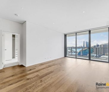 Spacious Two-bedroom Apartment with Breathtaking Water and City View - Photo 1