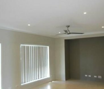 Spacious 4-Bedroom Home Backing Onto the Golf Course - Photo 2