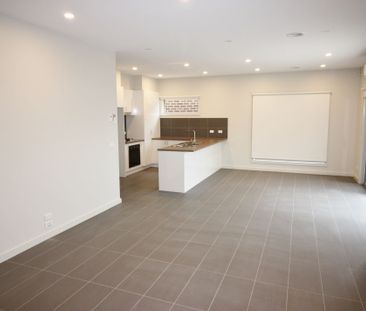 MODERN TWO BEDROOM UNIT WITH DOUBLE GARAGE - Photo 2