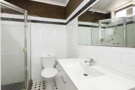 Two-Bedroom Gem with Secure Parking in a Winning Location! - Photo 5