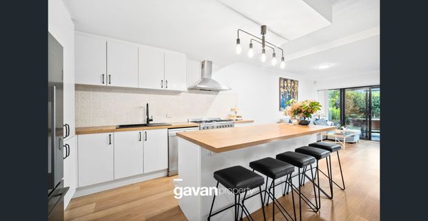 Modern Three-Bedroom Townhouse in a Peaceful Illawong Setting - Photo 1