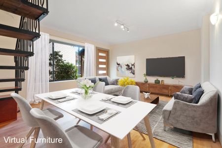 Spacious & Bright Two Storey Apartment! - Photo 3