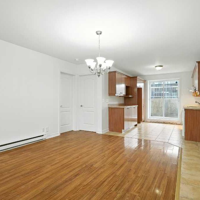 TRÈS GRAND APPARTEMENT 5 1/2 DE +- 1365 PI.CA AVEC THERMOPOMPE À LOUER À SAINT-RÉMI DÈS MAINTENANT! - Photo 1