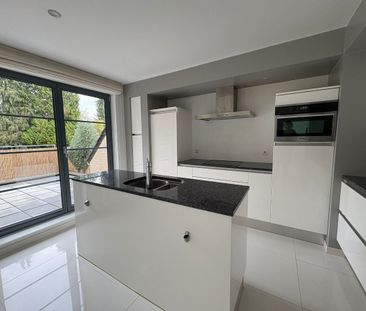 Ruim 1 slpk, groot terras en autotandplaats in Kortessem. - Foto 2