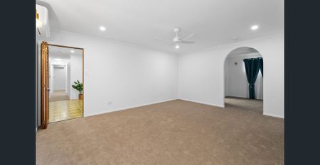 Freshly Updated Family Home with Large Fully Fenced Backyard - Photo 2